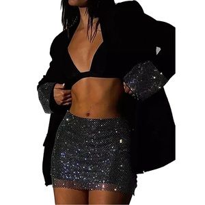 Skirt Suit Set with rhinestone embellishments.
